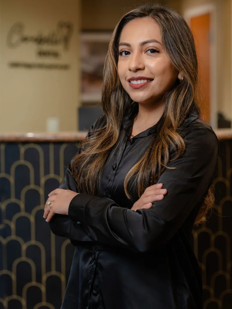 Stephaniea, dental hygienist at Carabelli Dental, in a professional portrait.